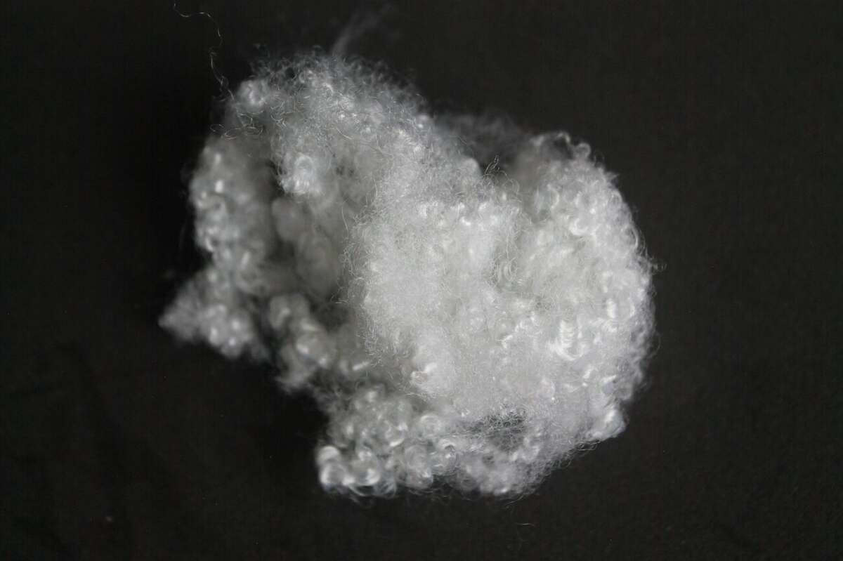 Raw white recycled hollow conjugated polyester staple fiber tuft