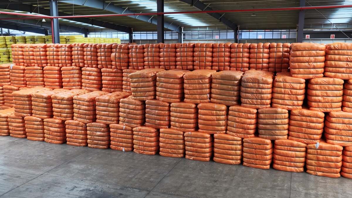 Recycled polyester staple fiber bales in warehouse